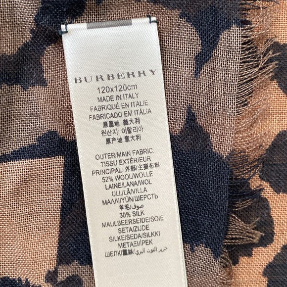 Burberry scarf and a black and tan animal print - Picture 4 of 5